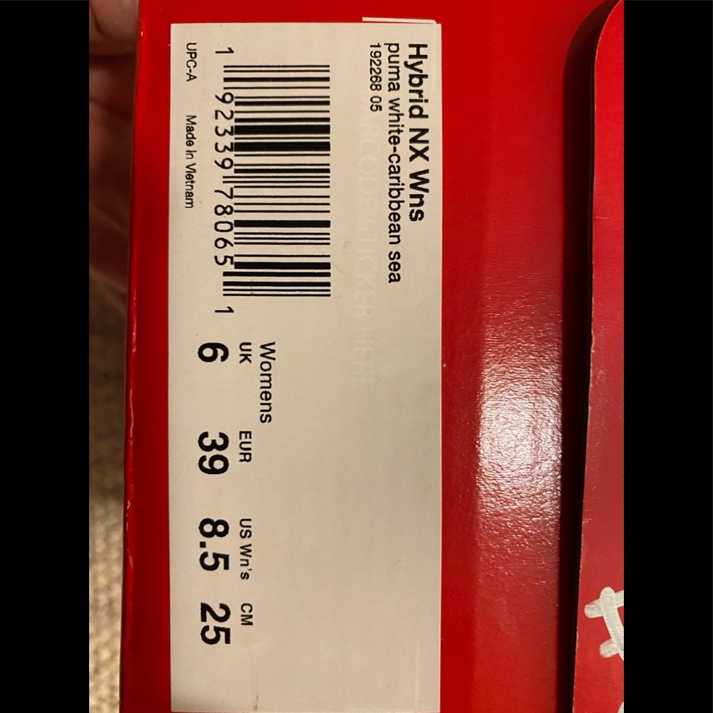 Puma running sneaker in original box.